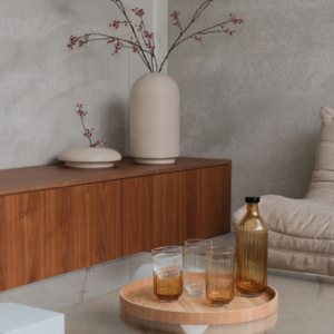 Table with ribbed vases in natural colors