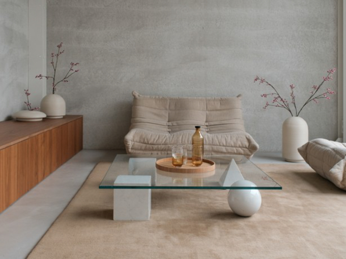 Table with ribbed vases in natural colors