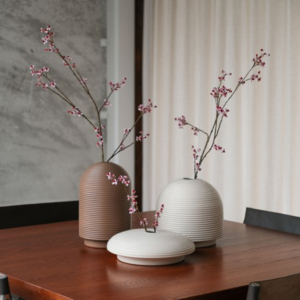 Table with ribbed vases in natural colors