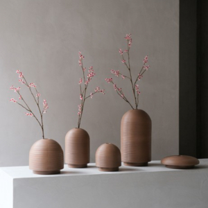 Table with ribbed vases in natural colors