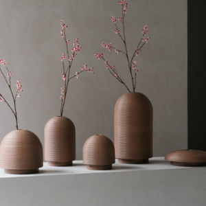 Table with ribbed vases in natural colors