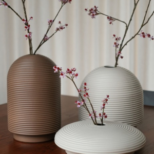Table with ribbed vases in natural colors