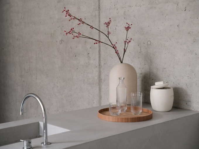 Table with ribbed vases in natural colors