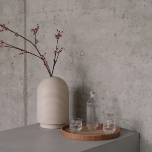 Table with ribbed vases in natural colors