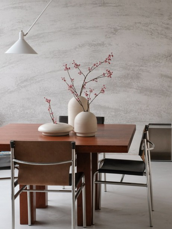 Table with ribbed vases in natural colors