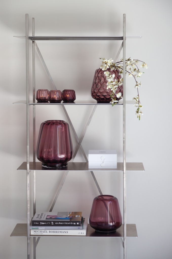 Lifestyle shot for the Kuro collection, showing vases and T-lights in color plum.