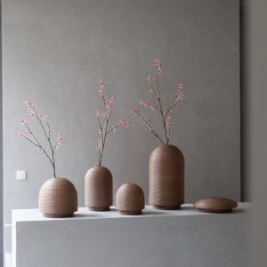 Table with ribbed vases in natural colors