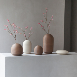 Table with ribbed vases in natural colors