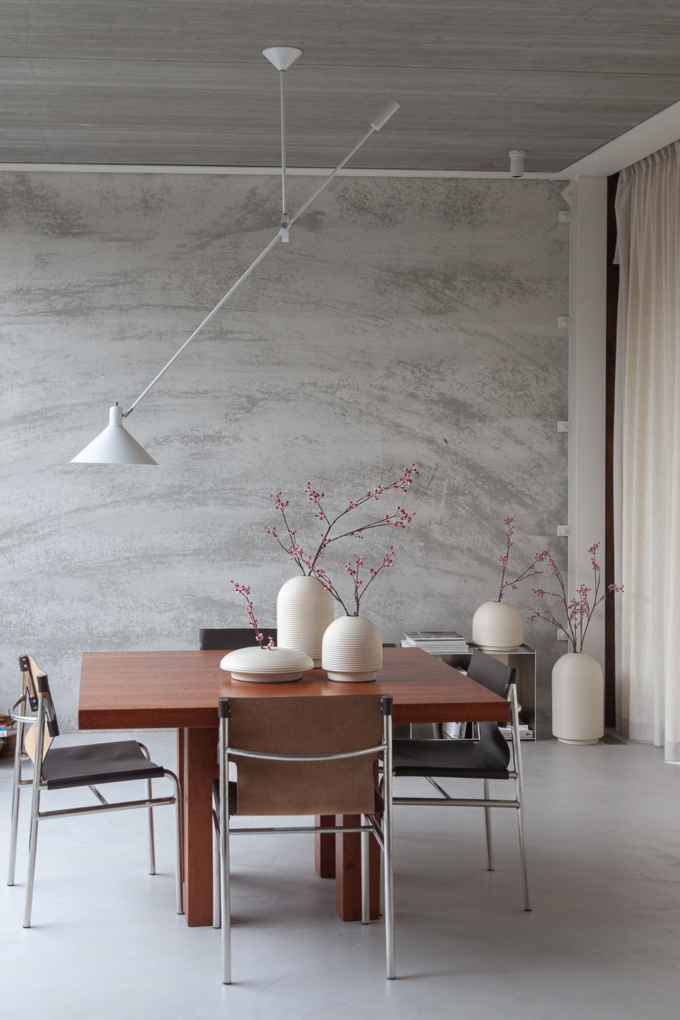 Table with ribbed vases in natural colors