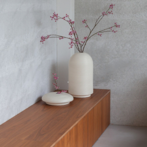 Table with ribbed vases in natural colors