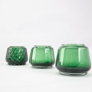 XLBoom Kuro T-light set of 3 in moss green hand-blown tea light holders on white surface.