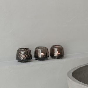 XLBoom Kuro T-Light Mix Set of 3 in smokey glass displayed on light concrete ledge
