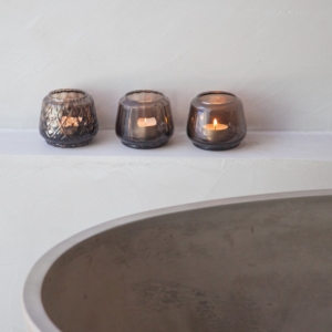 XLBoom Kuro T-Light Mix Set of 3 in smokey glass displayed on light concrete ledge